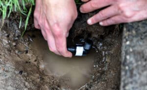 Plano TX emergency sprinkler repair responding to a line break